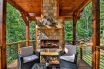 Come relax by the outdoor fireplace